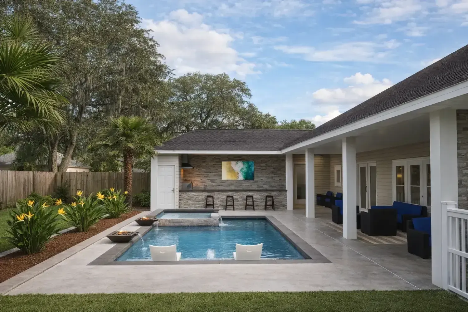 3D rendering: pool and spa set into the corner of the house beside a covered lanai